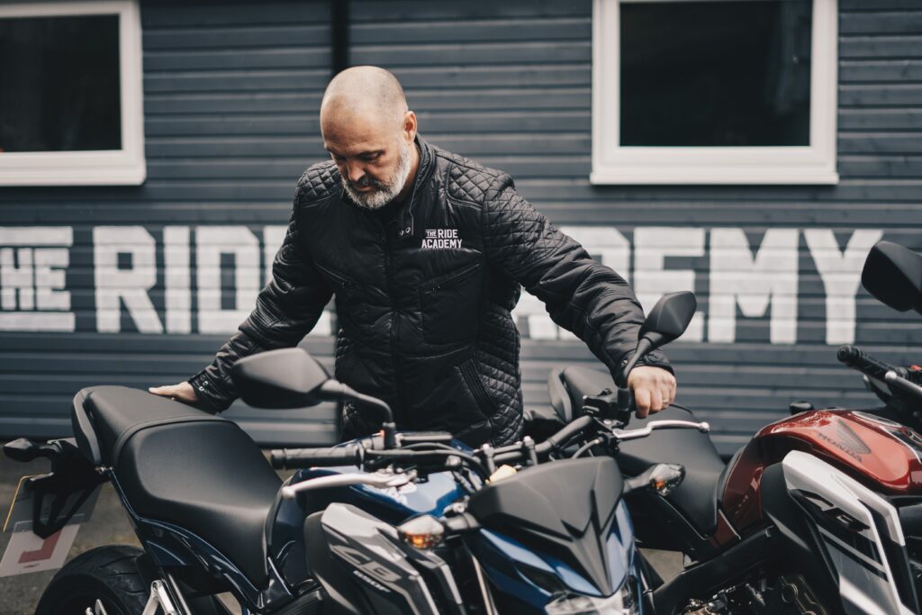 Man wearing a leather motorbike jacket