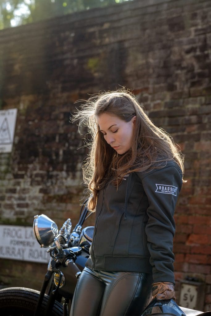 Armoured motorcycle hoodie and leather-look leggings for women.