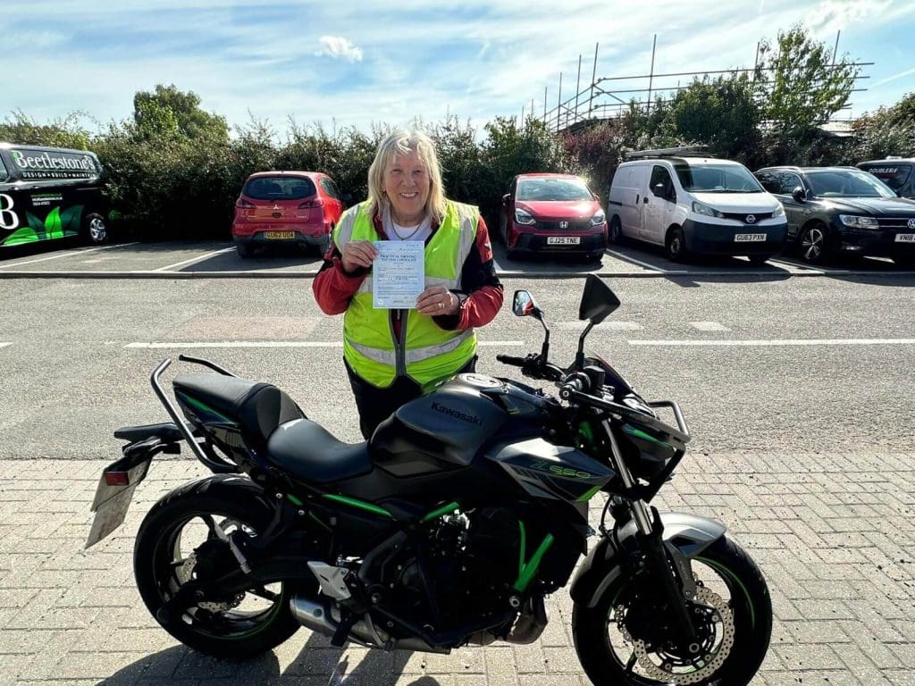 Linda Pilbeam, 71, holding her new motorcycle licence.